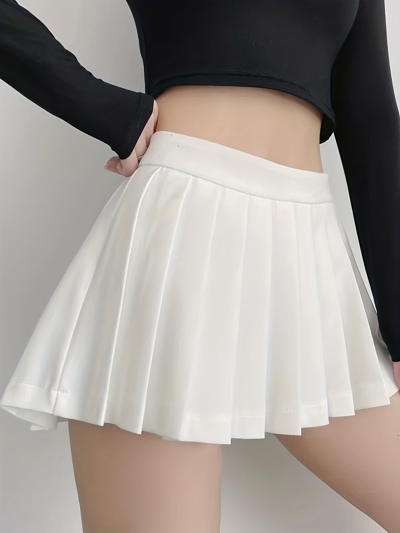 Crisp White Pleated Mini Skirt and Thigh-High Socks